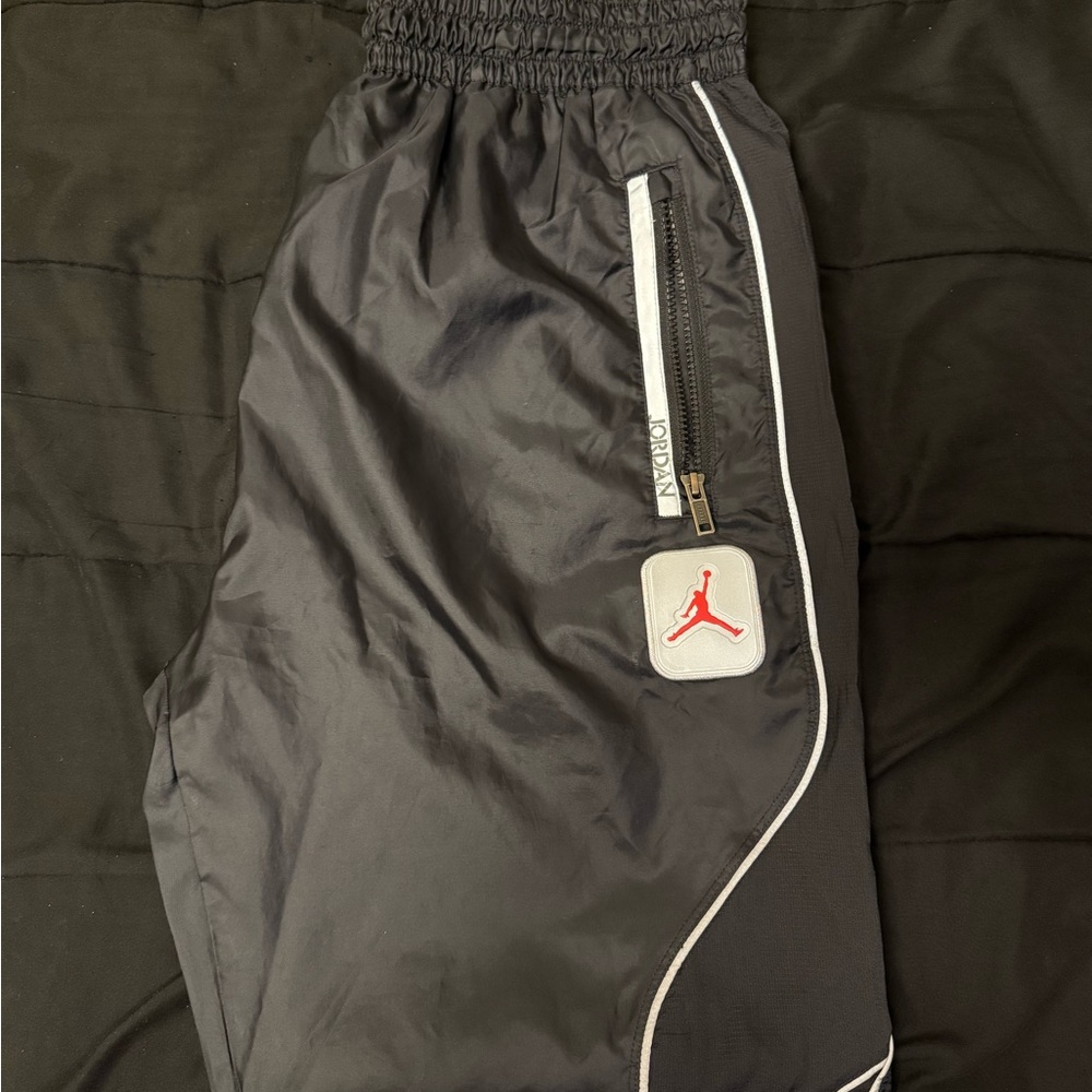 Jordan Black Mesh Track Pants with Red Accents
